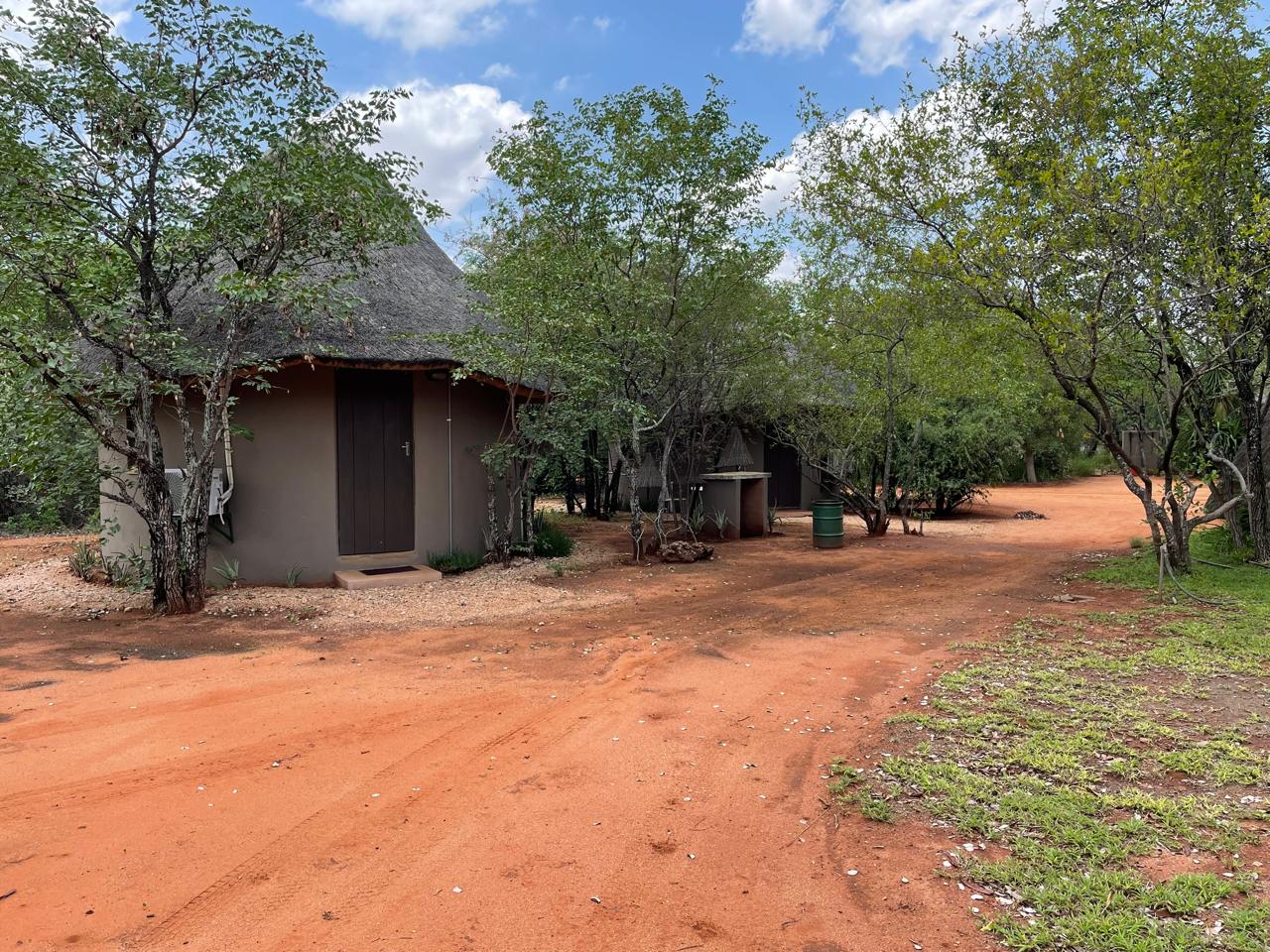 Red-earth road through camp